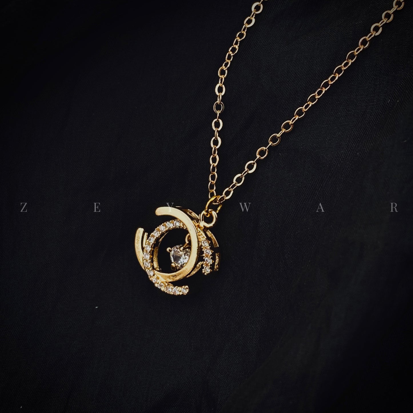 Elegance meets edge - Chanel Zircon Pendant
